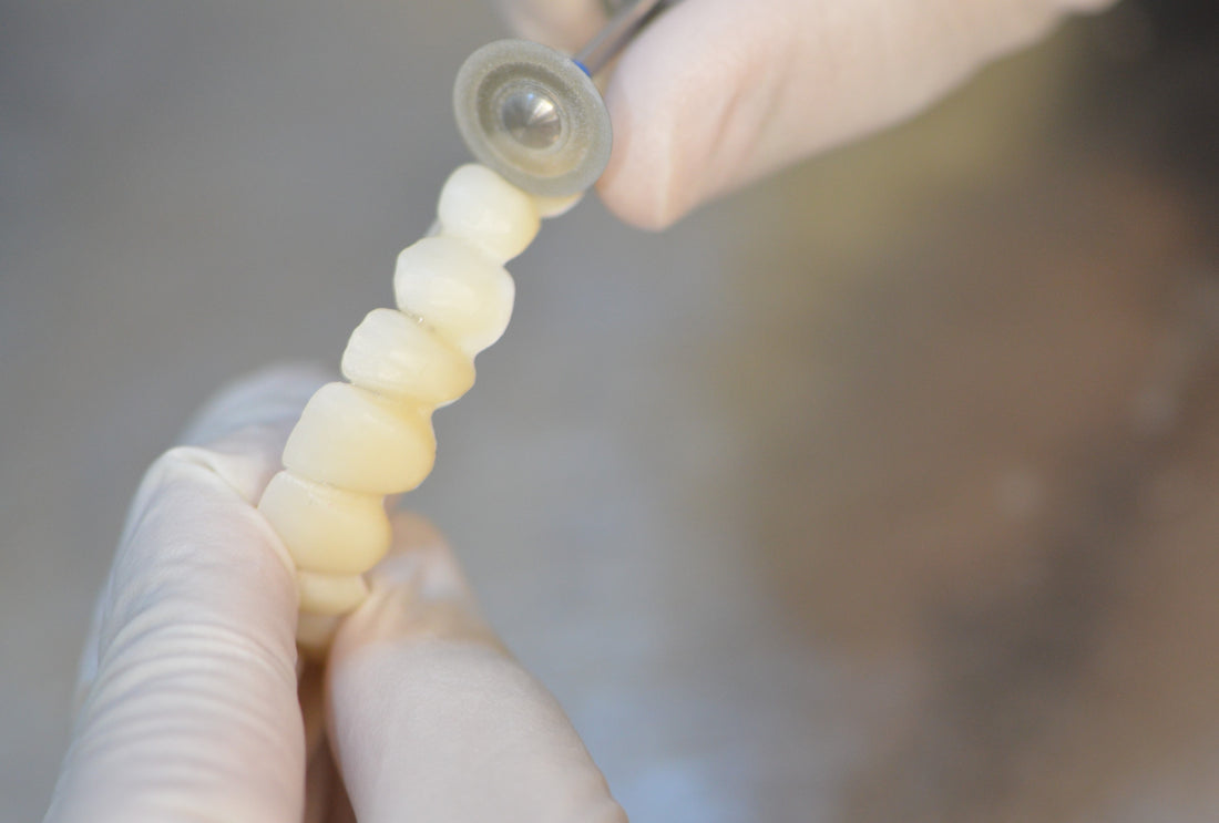 A milling process phase of dental teeth at the Final Cut Dental Milling laboratory